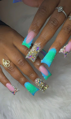 Pink and turquoise ombré coffin nails with rhinestones and glitter