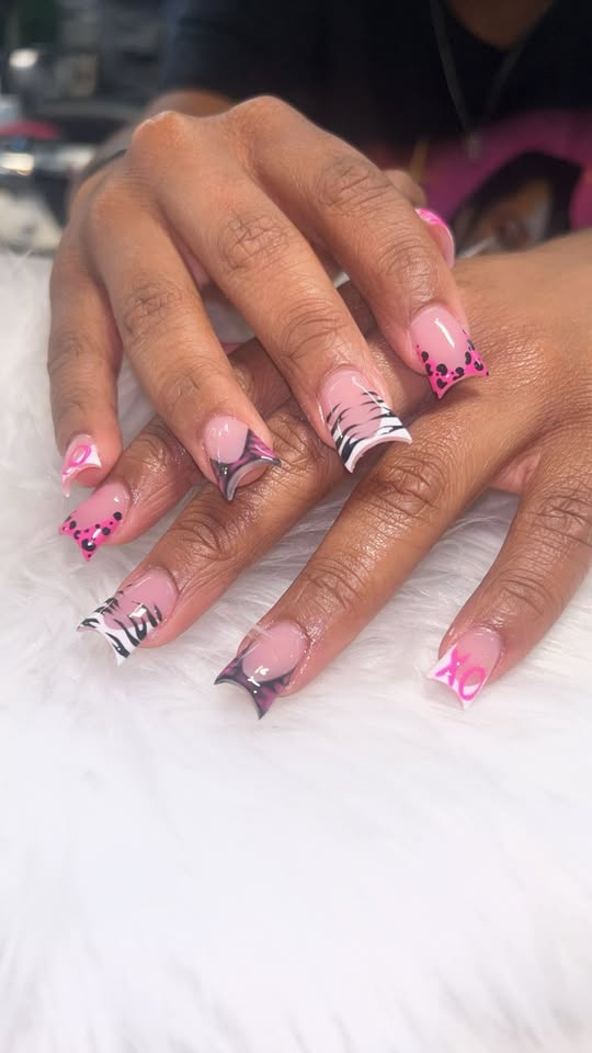 Pink French tips with zebra, leopard and XO accents